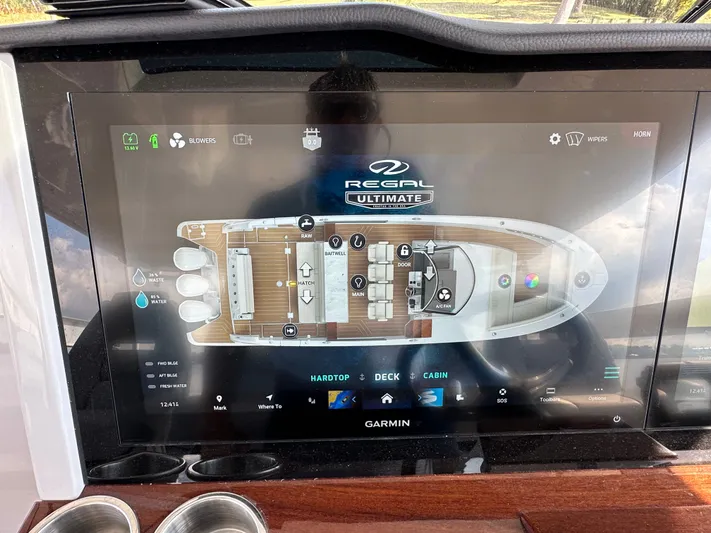  Yacht Photos Pics Touchscreen display of 2026 Regal 38 SAV boat control system with layout and settings.