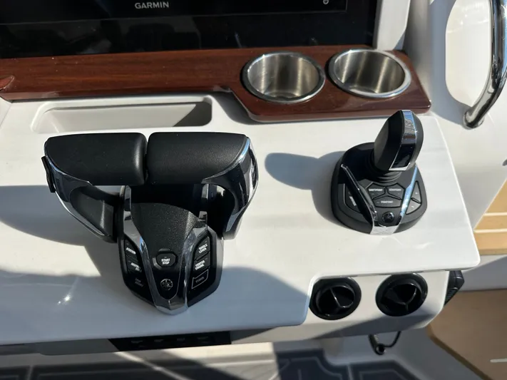 Yacht Photos Pics 2026 Regal 38 SAV boat controls with joystick and throttle levers.