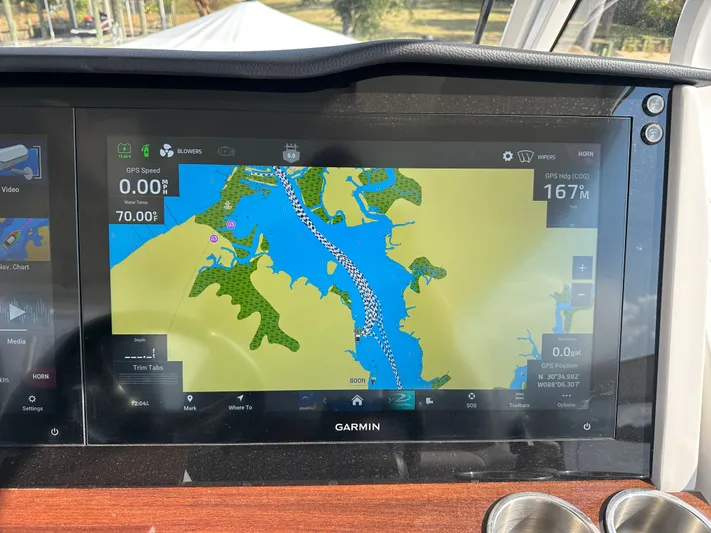  Yacht Photos Pics Garmin navigation display on 2026 Regal 38 SAV boat, showing map and GPS data.