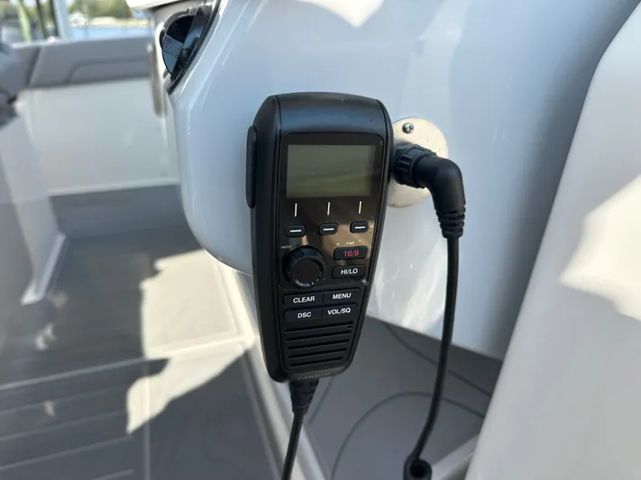  Yacht Photos Pics VHF radio on 2026 Regal 38 SAV boat, mounted for communication.