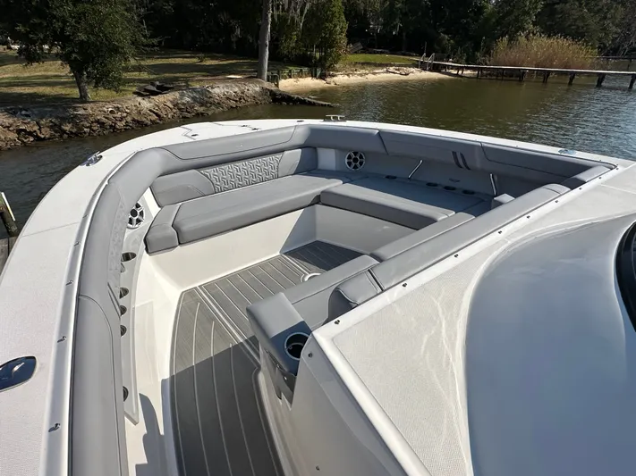  Yacht Photos Pics 2026 Regal 38 SAV boat interior with sleek gray seating and modern design.