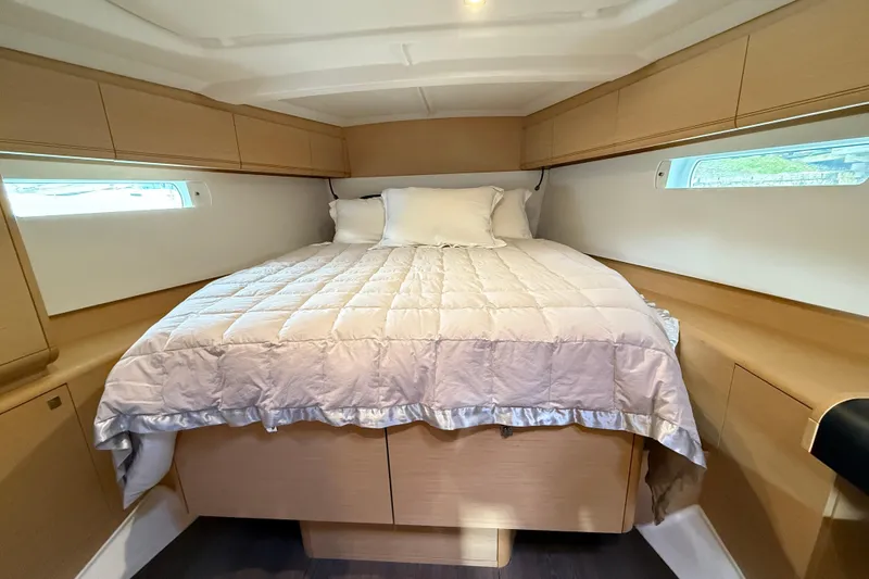 Shaboom Yacht Photos Pics Luxurious cabin interior of 2017 Jeanneau Sun Odyssey 479 yacht with cozy bedding.