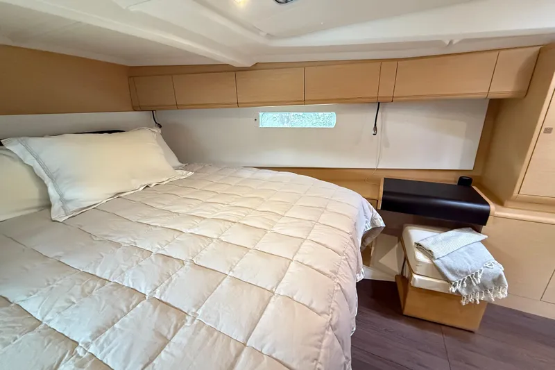 Shaboom Yacht Photos Pics Luxurious cabin interior of 2017 Jeanneau Sun Odyssey 479 yacht with cozy bedding.