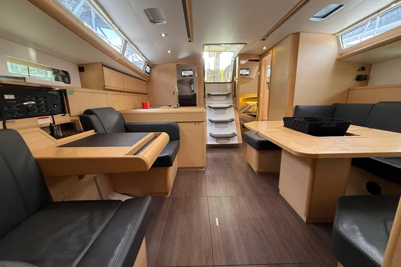 Shaboom Yacht Photos Pics Interior of 2017 Jeanneau Sun Odyssey 479 yacht, featuring modern design and comfortable seating.