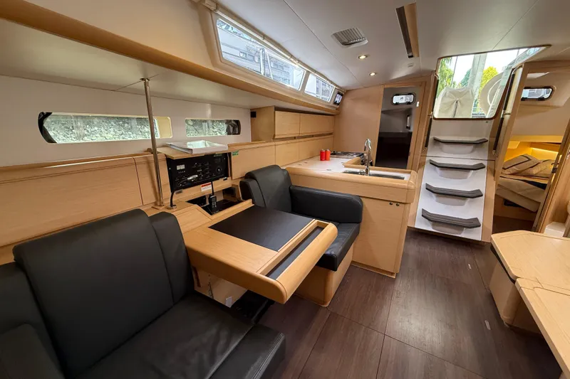 Shaboom Yacht Photos Pics Interior of 2017 Jeanneau Sun Odyssey 479 yacht, featuring modern design and comfortable seating.