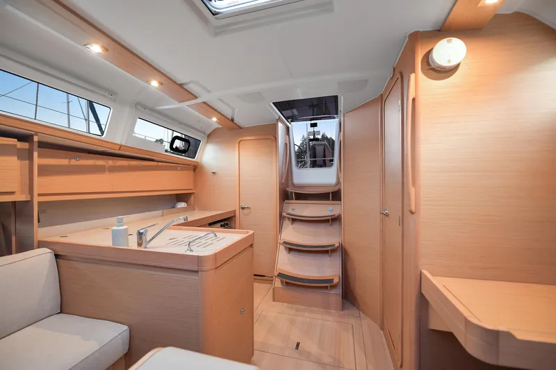 Mayne Deck Yacht Photos Pics Interior of 2019 Dufour 382 Grand Large yacht with modern wood finish.