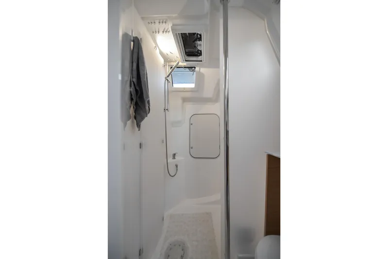 Mayne Deck Yacht Photos Pics 2019 Dufour 382 Grand Large yacht bathroom with shower and towel.