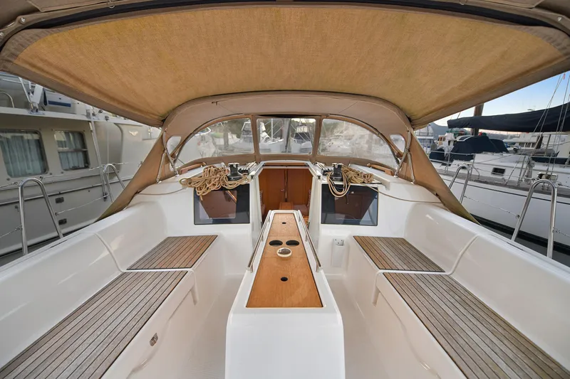Mayne Deck Yacht Photos Pics 2019 Dufour 382 Grand Large sailboat cockpit with seating and canopy.