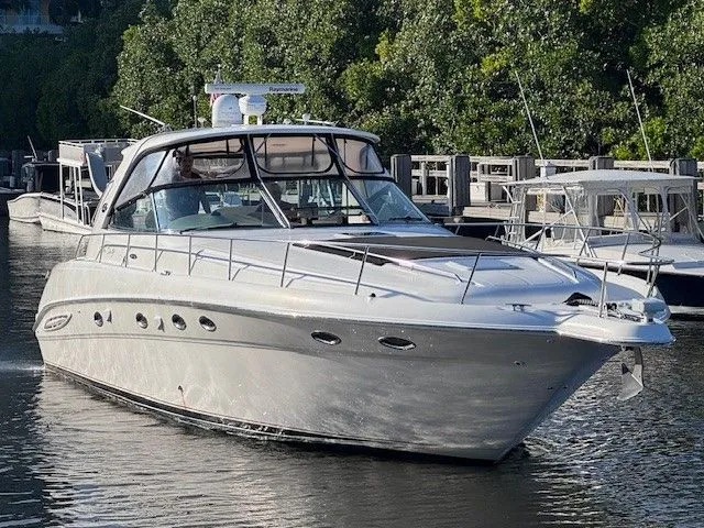  Yacht Photos Pics 2002 Sea Ray 460 Sundancer yacht docked in harbor.