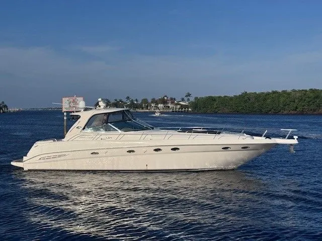  Yacht Photos Pics 2002 Sea Ray 460 Sundancer on calm waters.