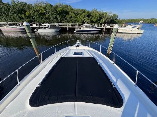  Yacht Photos Pics Deck view of 2002 Sea Ray 460 Sundancer at dock.