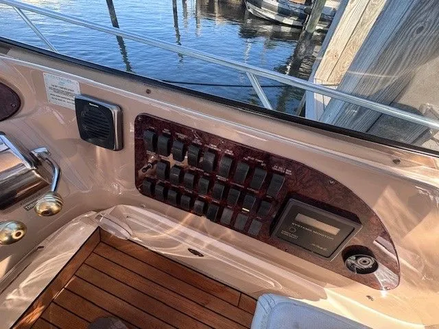  Yacht Photos Pics Sea Ray 460 Sundancer 2002 control panel with wooden deck.