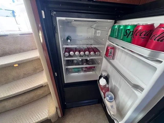  Yacht Photos Pics Open fridge on a 2002 Sea Ray 460 Sundancer yacht.