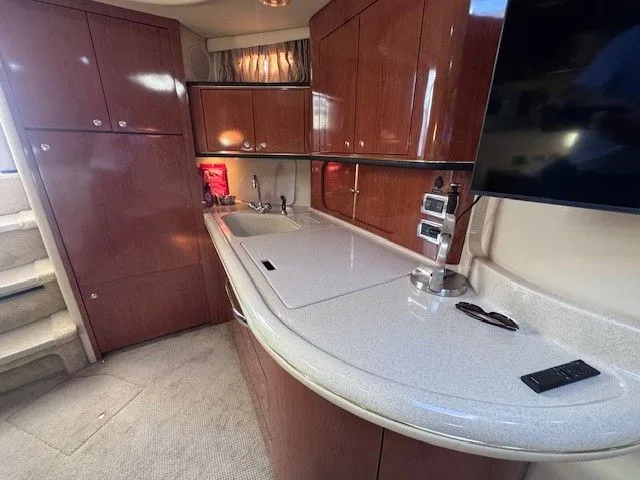  Yacht Photos Pics Interior of 2002 Sea Ray 460 Sundancer with elegant kitchen.