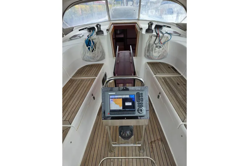  Yacht Photos Pics Interior view of 2010 Hanse 400e sailboat cockpit with navigation equipment.