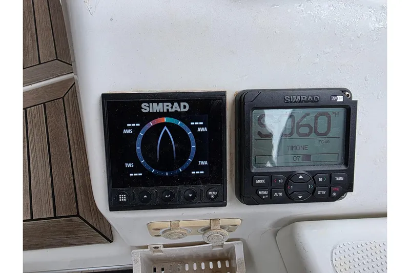  Yacht Photos Pics Simrad navigation instruments on a 2010 Hanse 400e yacht dashboard.