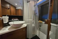 Luxurious bathroom in 2014 Princess V48 Open yacht with modern fixtures and elegant design.