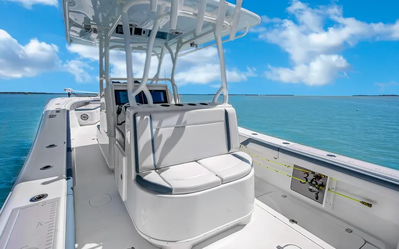  Yacht Photos Pics 2019 Yellowfin 36 boat on clear blue water under a sunny sky.