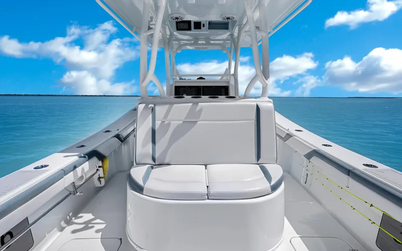  Yacht Photos Pics 2019 Yellowfin 36 boat interior with seating, ocean view, and blue sky.