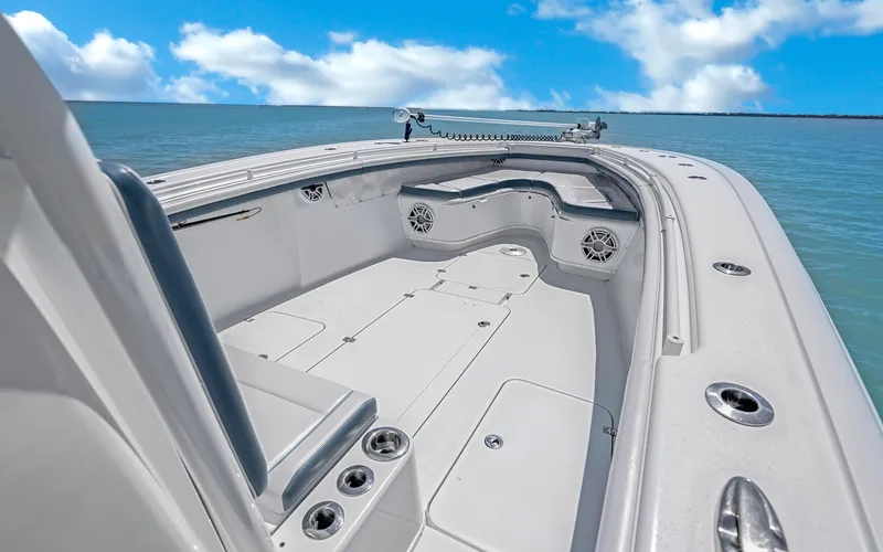  Yacht Photos Pics 2019 Yellowfin 36 boat deck with ocean view, featuring spacious seating and storage.