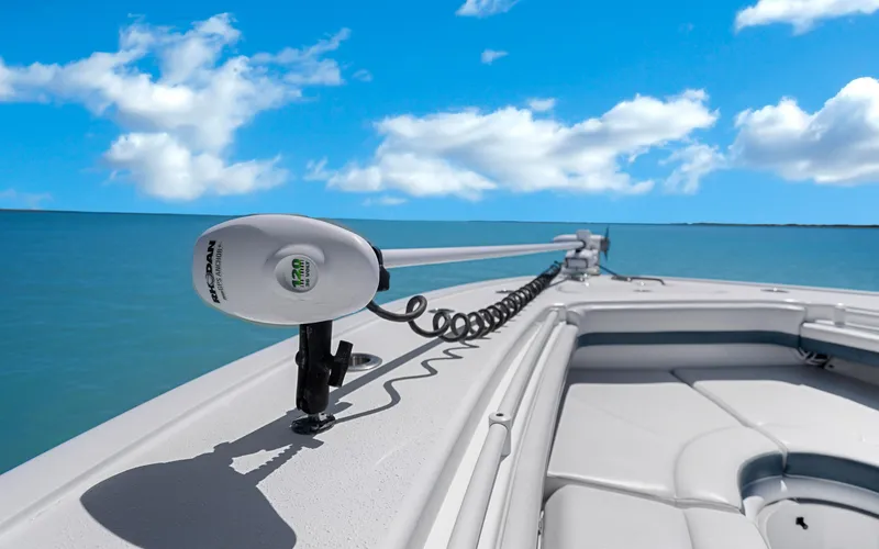  Yacht Photos Pics 2019 Yellowfin 36 boat with trolling motor on calm ocean under blue sky.