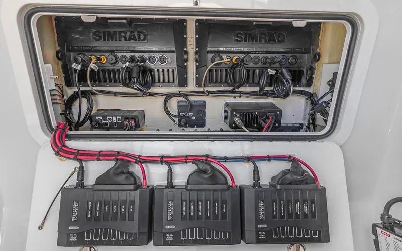  Yacht Photos Pics 2019 Yellowfin 36 boat electronics panel with Simrad systems and wiring.