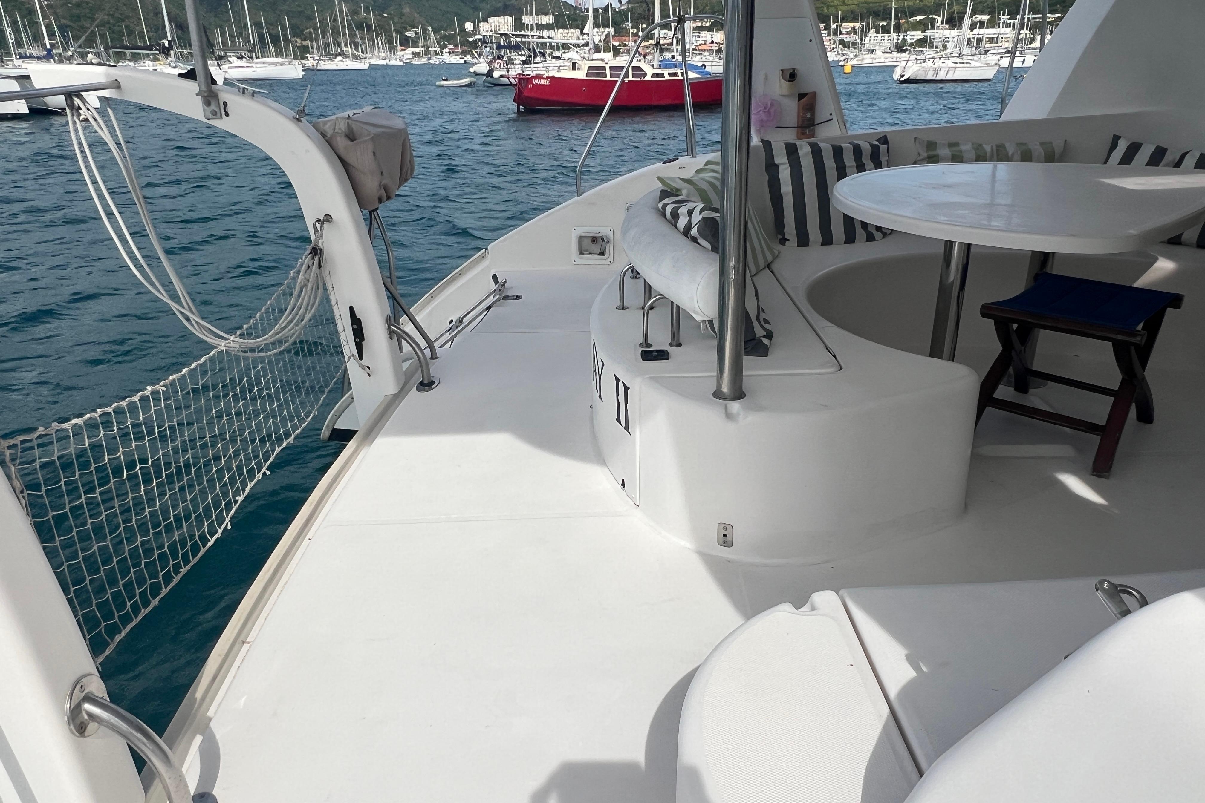 Leopard 40 catamaran deck with seating area, docked in a marina, 2005 model.