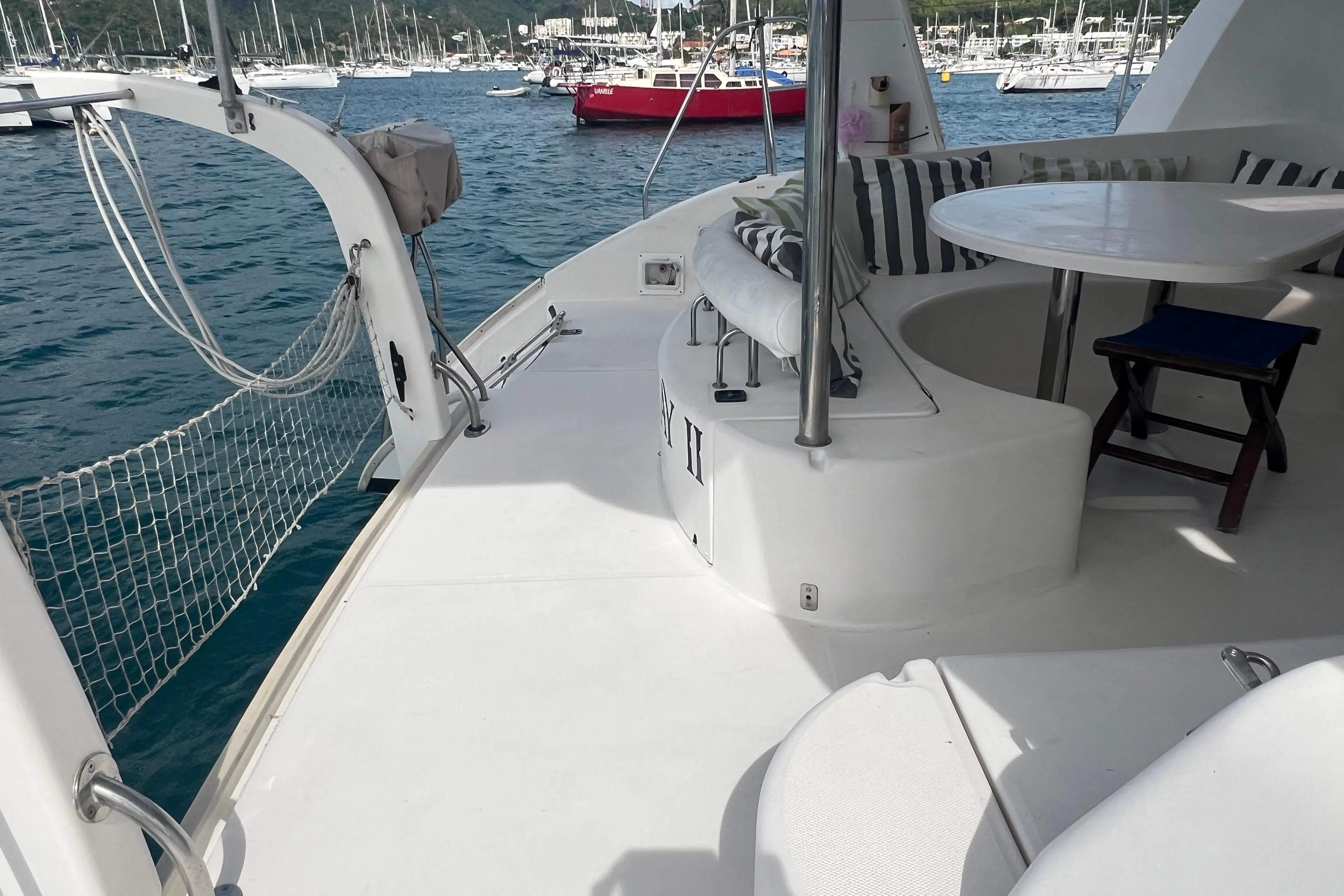 Leopard 40 catamaran deck with seating area, docked in a marina, 2005 model.