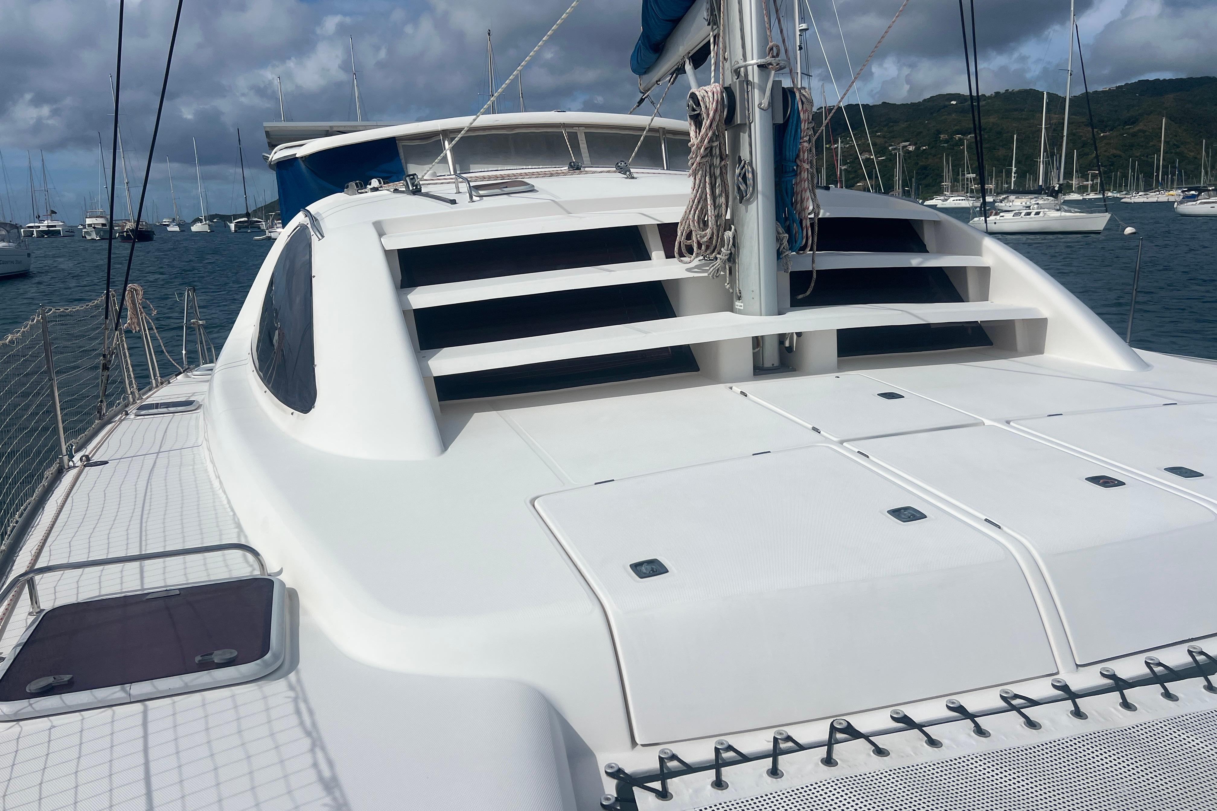 2005 Leopard 40 catamaran on water, featuring sleek design and spacious deck.