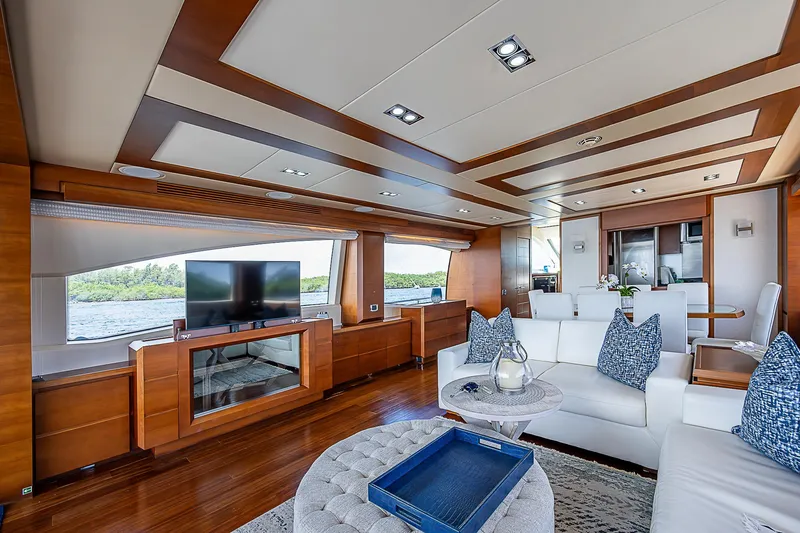 Reset Yacht Photos Pics Luxurious interior of 2011 Azimut 82 yacht with modern furnishings and large windows.