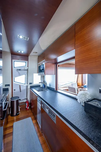 Reset Yacht Photos Pics Luxurious kitchen interior of 2011 Azimut 82 yacht with modern amenities.