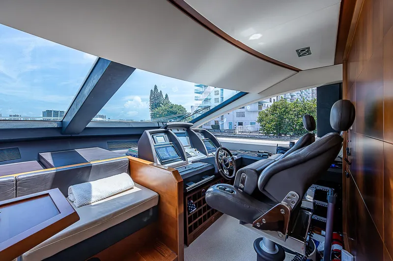 Reset Yacht Photos Pics Luxurious 2011 Azimut 82 yacht interior with modern helm and panoramic windows.