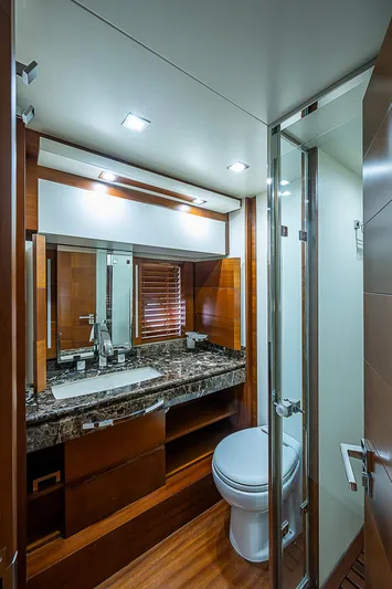 Reset Yacht Photos Pics Luxurious bathroom in 2011 Azimut 82 yacht with modern fixtures and elegant design.