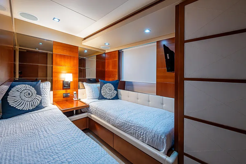 Reset Yacht Photos Pics Luxurious cabin interior of 2011 Azimut 82 yacht with twin beds and modern decor.