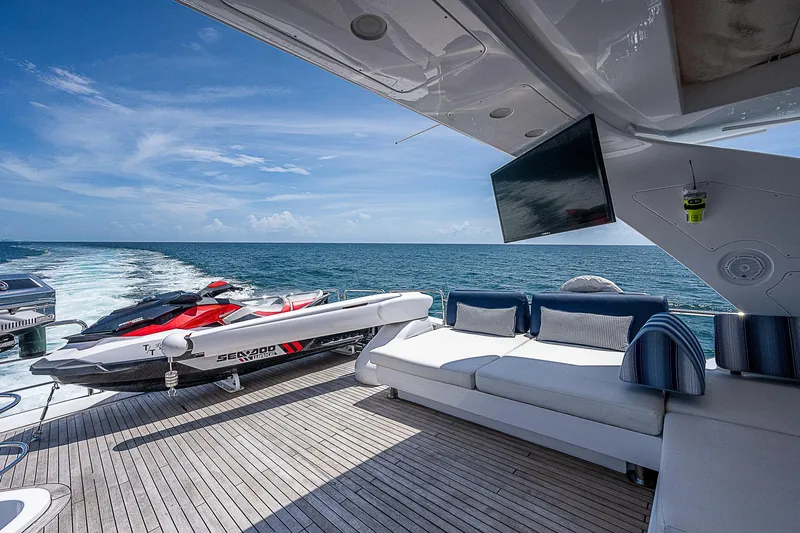 Reset Yacht Photos Pics Luxurious 2011 Azimut 82 yacht deck with jet ski and ocean view.