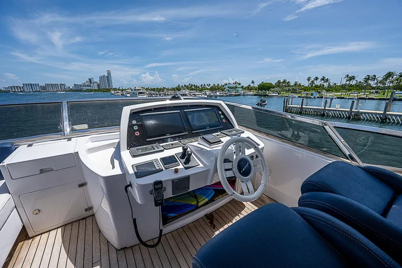 Reset Yacht Photos Pics Azimut 82 yacht helm, 2011 model, with ocean view and modern controls.