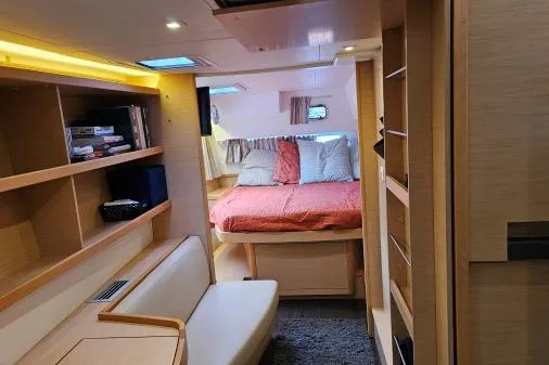 Never Say Never Yacht Photos Pics Interior of 2017 Lagoon 42 catamaran with cozy bedroom and modern furnishings.