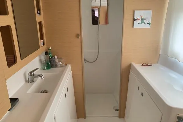 Never Say Never Yacht Photos Pics Bathroom interior of 2017 Lagoon 42 catamaran with modern fixtures and shower.