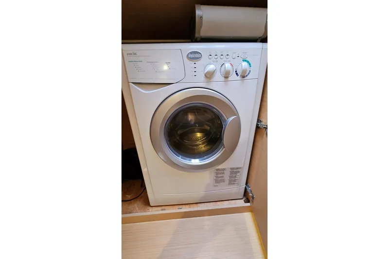 Never Say Never Yacht Photos Pics Front-loading washing machine inside a Lagoon 42, 2017 model.