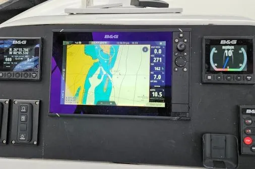 Never Say Never Yacht Photos Pics Navigation system on a 2017 Lagoon 42 catamaran, displaying nautical charts and data.