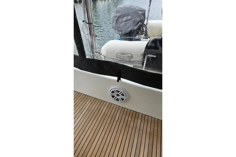 Never Say Never Yacht Photos Pics 2017 Lagoon 42 yacht deck with Yamaha engine cover and marine speaker.