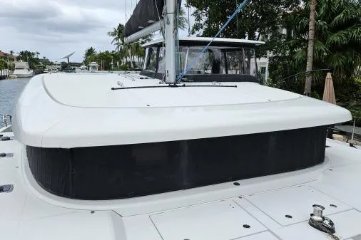 Never Say Never Yacht Photos Pics 2017 Lagoon 42 catamaran docked, showcasing sleek design and spacious deck.