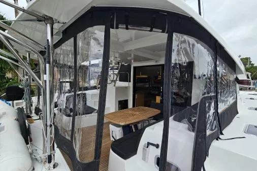Never Say Never Yacht Photos Pics 2017 Lagoon 42 catamaran with enclosed cockpit and modern interior design.