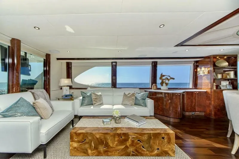 Serendipity Yacht Photos Pics Luxurious interior of 2001 Lazzara 94 Motor Yacht with elegant furnishings and ocean view.