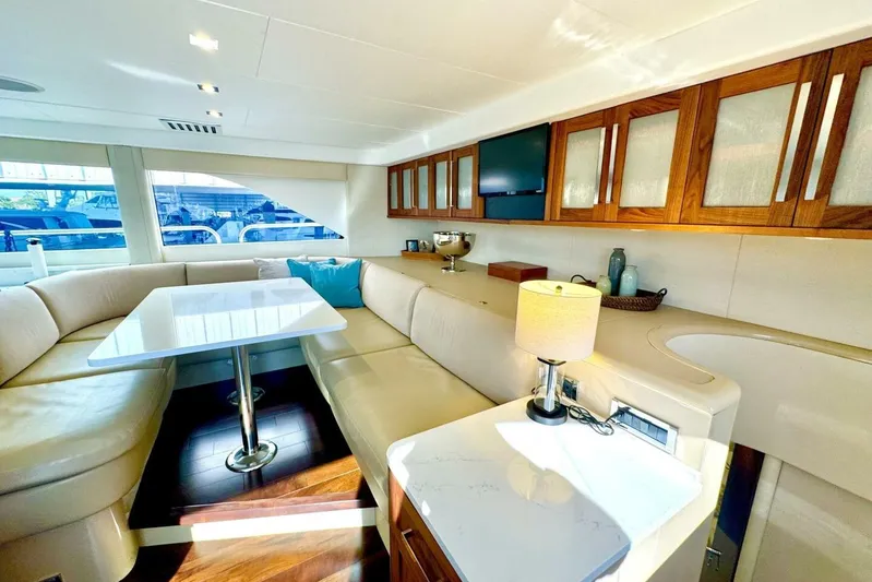 Serendipity Yacht Photos Pics Luxurious interior of 2001 Lazzara 94 Motor Yacht with elegant seating and modern decor.