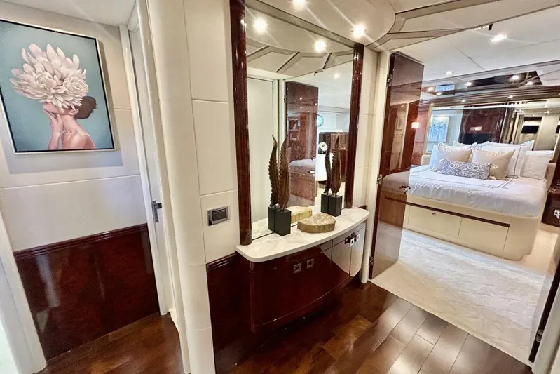Serendipity Yacht Photos Pics Luxurious interior of 2001 Lazzara 94 Motor Yacht with elegant bedroom and modern decor.