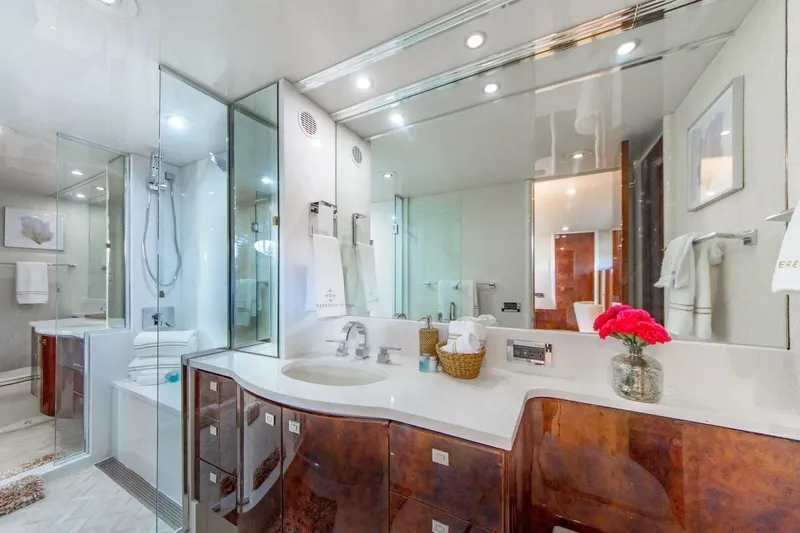 Serendipity Yacht Photos Pics Luxurious bathroom in 2001 Lazzara 94 Motor Yacht with elegant fixtures and modern design.