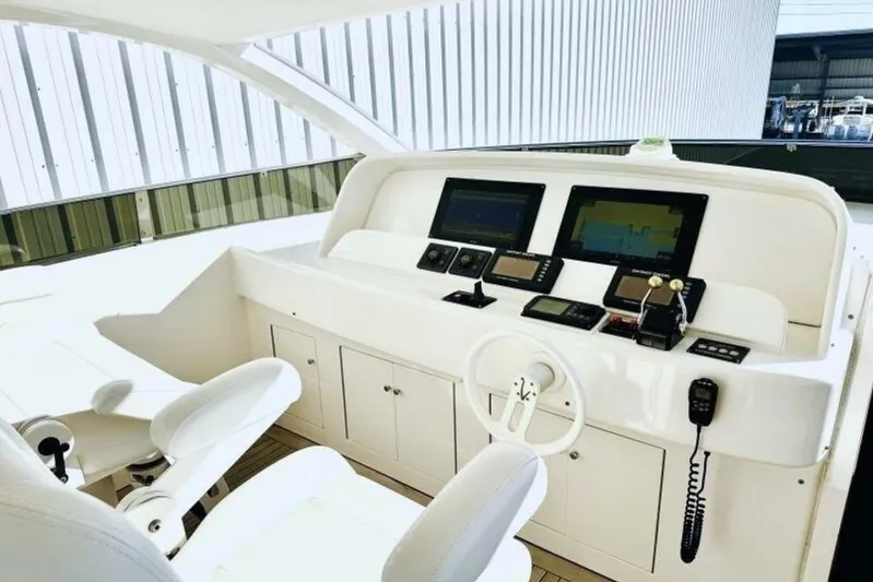 Serendipity Yacht Photos Pics Helm of 2001 Lazzara 94 Motor Yacht with modern navigation equipment and controls.