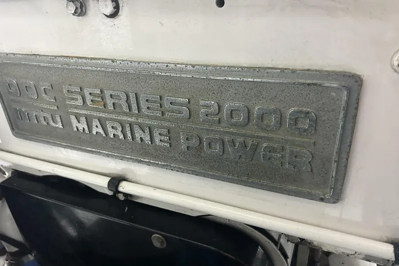 Serendipity Yacht Photos Pics Plaque displaying "DDC Series 2000 MTU Marine Power" on a 2001 Lazzara 94 Motor Yacht.