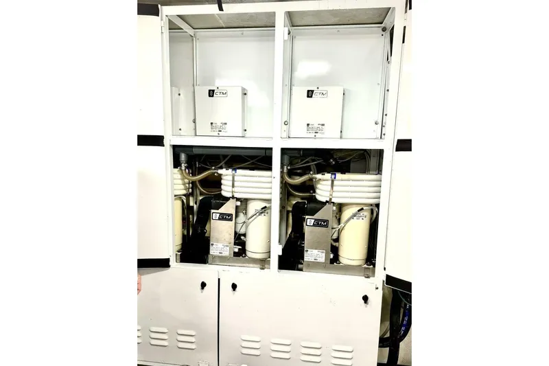 Serendipity Yacht Photos Pics Engine room of 2001 Lazzara 94 Motor Yacht with CTM equipment.